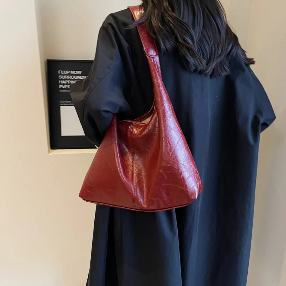 Bolsa Feminina Hobos Couro de Alça Grande Zipper