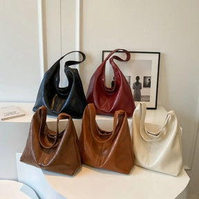Bolsa Feminina Hobos Couro de Alça Grande Zipper