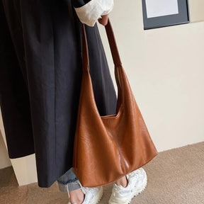 Bolsa Feminina Hobos Couro de Alça Grande Zipper